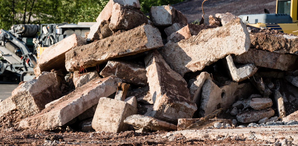 dribble in the middle of a patio with some dumpsters around